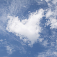 Buy canvas prints of White clouds heart shape authentic by Arletta Cwalina