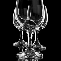 Buy canvas prints of Three empty wine glasses on black by Arletta Cwalina