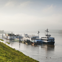 Buy canvas prints of ferry ships at Vistula River by Arletta Cwalina