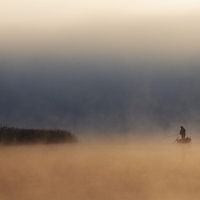 Buy canvas prints of  Lone fisher in quiet morning fog by Arletta Cwalina