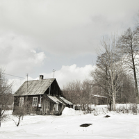 Buy canvas prints of dilapidated wooden house in winter by Arletta Cwalina