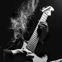 Buy canvas prints of Long hair man playing guitar by Arletta Cwalina