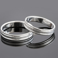 Buy canvas prints of Two silver wedding rings by Arletta Cwalina