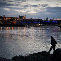 Buy canvas prints of Old Town across Vistula River by Arletta Cwalina