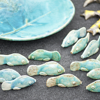 Buy canvas prints of Folk fish ceramic decorations by Arletta Cwalina