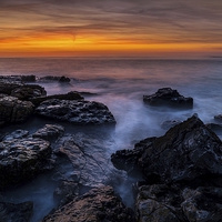 Buy canvas prints of  Rest Bay Rocks, Porthcawl by Dean Merry