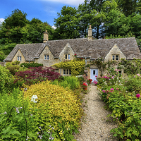 Buy canvas prints of Colourful Cotswold Stone Cottage by Dean Merry