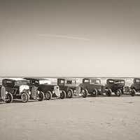 Buy canvas prints of  Hot rods on the beach by Dean Merry