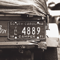 Buy canvas prints of  Trailer Plate by Dean Merry