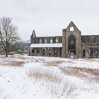 Buy canvas prints of Tintern Abbey is the snow by Dean Merry