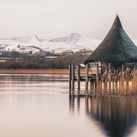Buy canvas prints of A Recreation of an Iron Age Hut, Lakeside by Dean Merry
