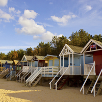 Buy canvas prints of Beach Huts at Wells-next-the-Sea by Christopher Hill