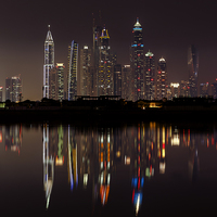 Buy canvas prints of Dubai skyline reflections by andy myatt