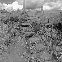 Buy canvas prints of A stile over a dry stone wall by Michael Hopes