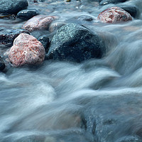 Buy canvas prints of water over pebbles by Michael Hopes