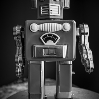 Buy canvas prints of Vintage Tin Toy Robot Black and white by Edward Fielding
