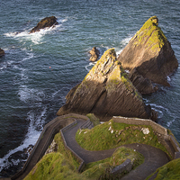 Buy canvas prints of  Dunquin Harbor Road by Brian Jannsen