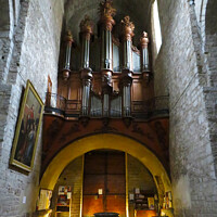 Buy canvas prints of Inside the church at Saint-Guilhem-le-Désert by Ann Biddlecombe
