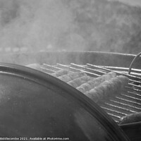 Buy canvas prints of sausages on a barbecue in monochrome by Ann Biddlecombe
