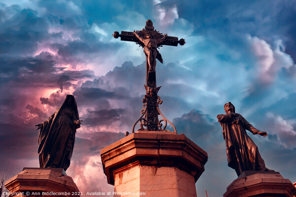 Christ statue with stormy sky Picture Board by Ann Biddlecombe