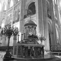 Buy canvas prints of At the Alter in Noyon Cathedral in monochrome by Ann Biddlecombe