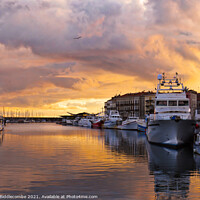 Buy canvas prints of Sunset over a French Port by Ann Biddlecombe