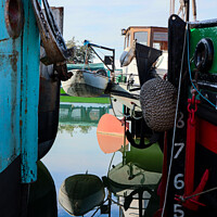 Buy canvas prints of Reflections between barges by Ann Biddlecombe