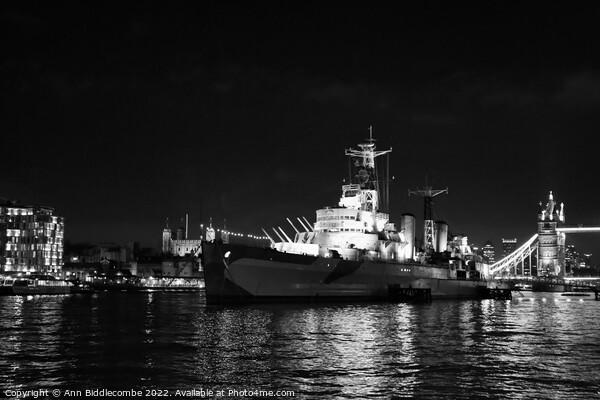 Black and white HMS Belfast on the Thames near Tow Picture Board by Ann Biddlecombe