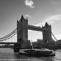 Buy canvas prints of Monochrome tower bridge with tourist boat by Ann Biddlecombe