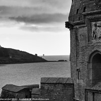 Buy canvas prints of Black and white St Mawes Castle with lighthouse in distance by Ann Biddlecombe