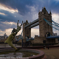 Buy canvas prints of A statue in front of Tower Bridge by Ann Biddlecombe