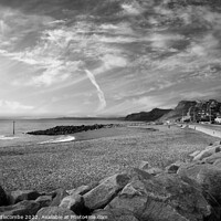 Buy canvas prints of Black and white West bay beach looking towards the cliffs by Ann Biddlecombe