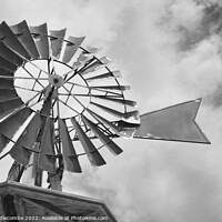 Buy canvas prints of Windmill On The Promenade in monochrome by Ann Biddlecombe