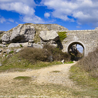 Buy canvas prints of Stone archway at Portland Quarry by Ann Biddlecombe