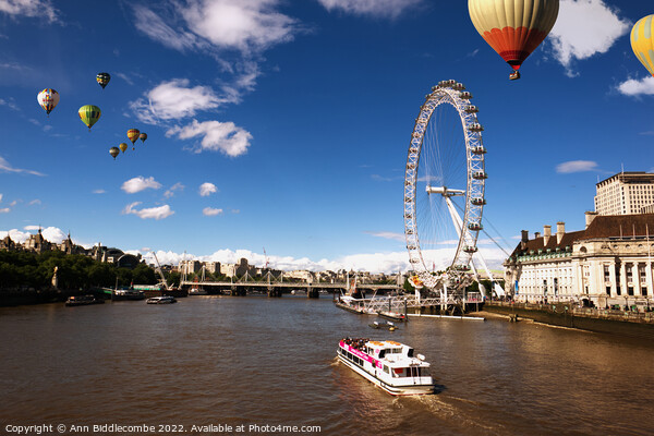 London eye as hot air balloon's fly over Picture Board by Ann Biddlecombe