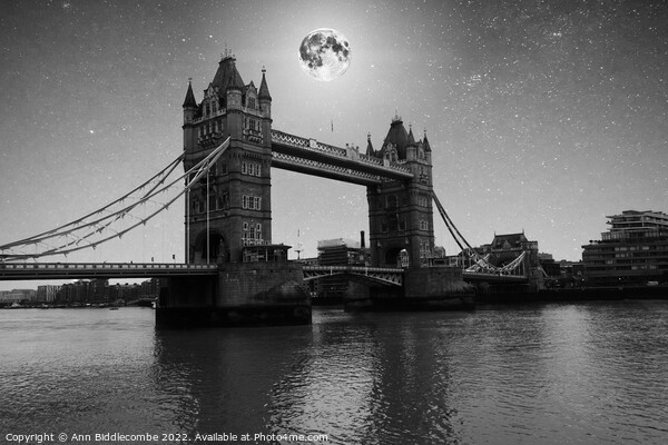 Monochrome Moon lit night over tower bridge Picture Board by Ann Biddlecombe