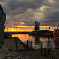 Buy canvas prints of Sunset behind the Memorial statue in Lowestoft by Ann Biddlecombe