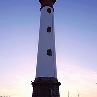 Buy canvas prints of Ouistreham Lighthouse by Ann Biddlecombe