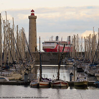 Buy canvas prints of Sete Marina Lighthouse and Ferry by Ann Biddlecombe