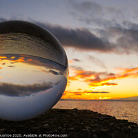 Buy canvas prints of Sphere sunset over the lagoon in Sete by Ann Biddlecombe