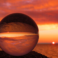 Buy canvas prints of Orange sky at night through sphere by Ann Biddlecombe