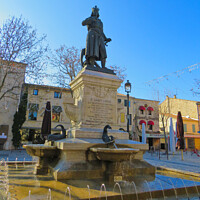 Buy canvas prints of Saint Louis  statue in Aigues Mortes by Ann Biddlecombe