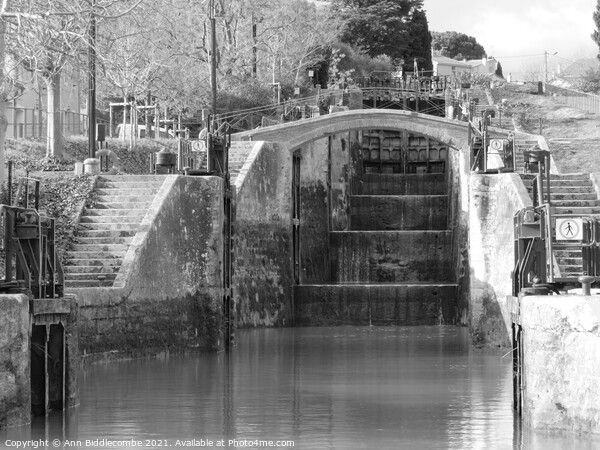 View up the locks on the Canal Du Midi in Black an Picture Board by Ann Biddlecombe