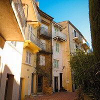 Buy canvas prints of A street in Cannes by Ann Biddlecombe