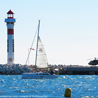 Buy canvas prints of Lighthouse, Yacht and Helicopter in Cannes by Ann Biddlecombe