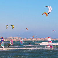 Buy canvas prints of Windsurfers and Kite surfers on Palm Beach by Ann Biddlecombe