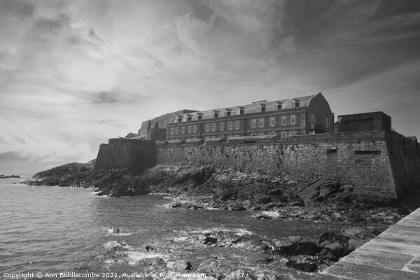 Castle Cornet in Guernsey in monochrome Picture Board by Ann Biddlecombe