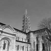 Buy canvas prints of Basilique Saint Sernin de Toulouse  in black and white by Ann Biddlecombe