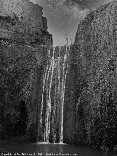 A Waterfall at Saint-Guilhem-le-Désert in black and white Picture Board by Ann Biddlecombe