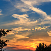 Buy canvas prints of Cirrus Sunset.  by Peter Bunker
